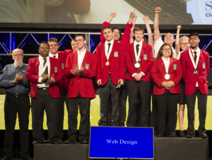 2016 national web design contest champions on stage in Louisville, KY after receiving medals.